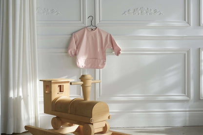 Bavoir à manches longues en polyester rose pour bébé