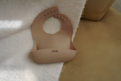 Bavoir en silicone beige pour enfant